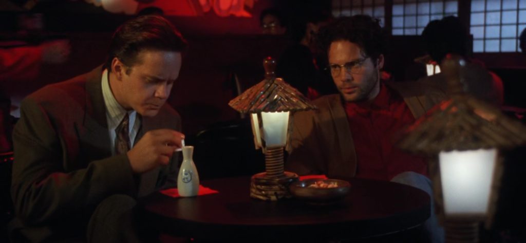 Griffin (Robbins) and David Kahane (D’Onofrio) having dinner at a nightclub