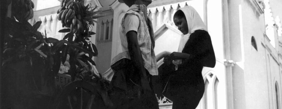 Maria, a Cuban local, with her beau, René. René sells bananas while dreaming of marrying his love.