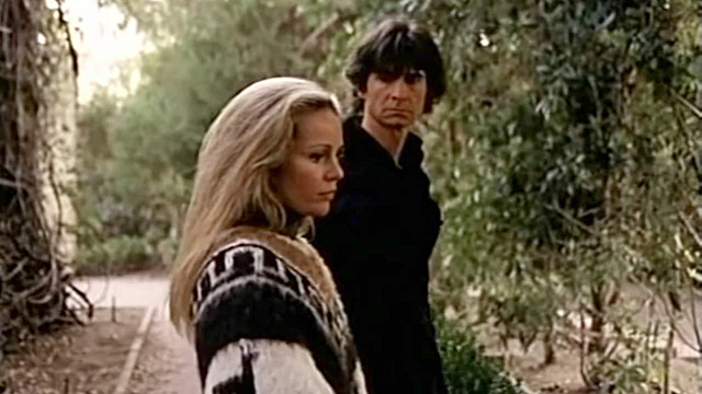 Tuesday Weld and Anthony Perkins with alt text, “Anthony Perkins as BZ looking at Tuesday Weld as Maria Wyeth