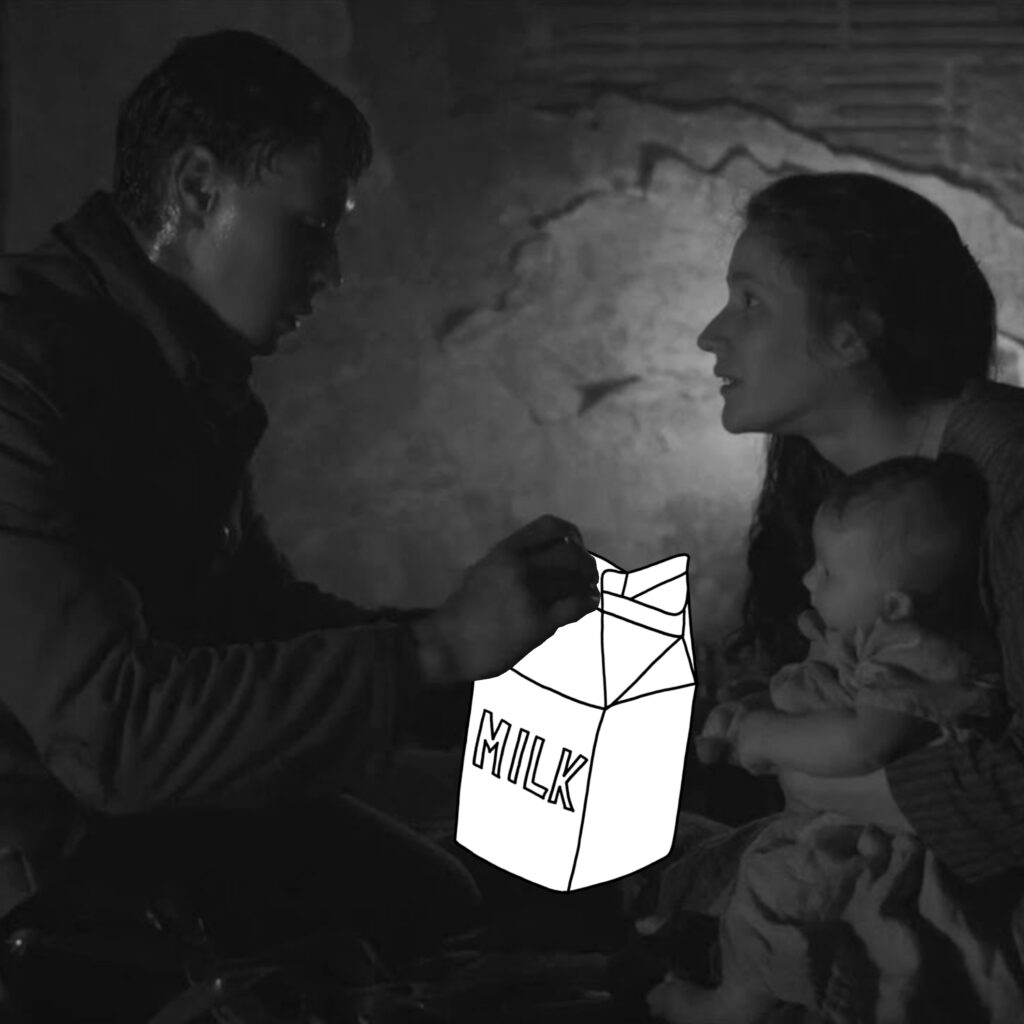 A WWI British soldier is handing a drawn carton of milk to a person holding a baby inside of a dark building.