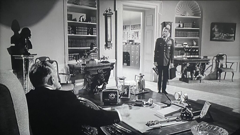 President Jordan Lyman (Fredric March) and Air Force General James Mattoon Scott (Burt Lancaster) meet in the Oval Office for their climactic confrontation in John Frankenheimer’s Seven Days in May (1964).
