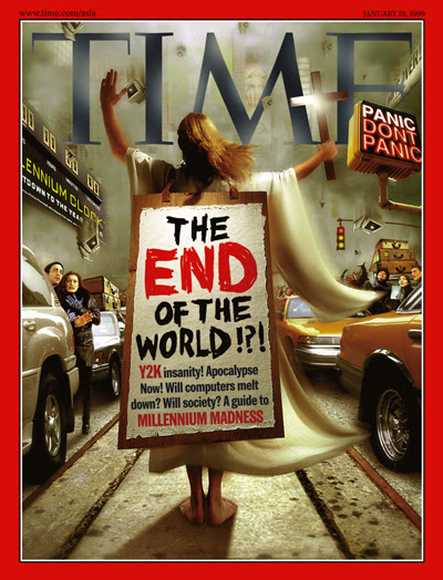 The Jan. 18, 1999, cover of TIME featuring an image of a Christ like figure clad in a white flowing robe, carrying a cross, and wearing a sandwich board that reads "The of the World? Y2K insanity! Apocalyspse Now! Will Computers melt down? Will society? A guide to MILLENNIUM MADNESSS." The figure is walking in the middle of a street in crisis. The Millennium clock counts down on the left and a street sign reads "Panic/Don't Panic."